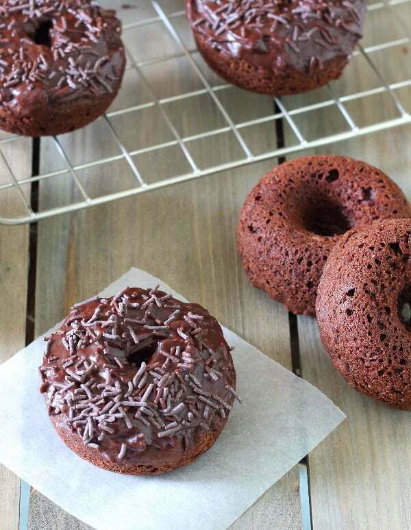 Baked Chocolate Doughnuts Recipe - Soft and fluffy and thickly frosted with a rich mocha ganache, they make getting out of bed worthwhile!