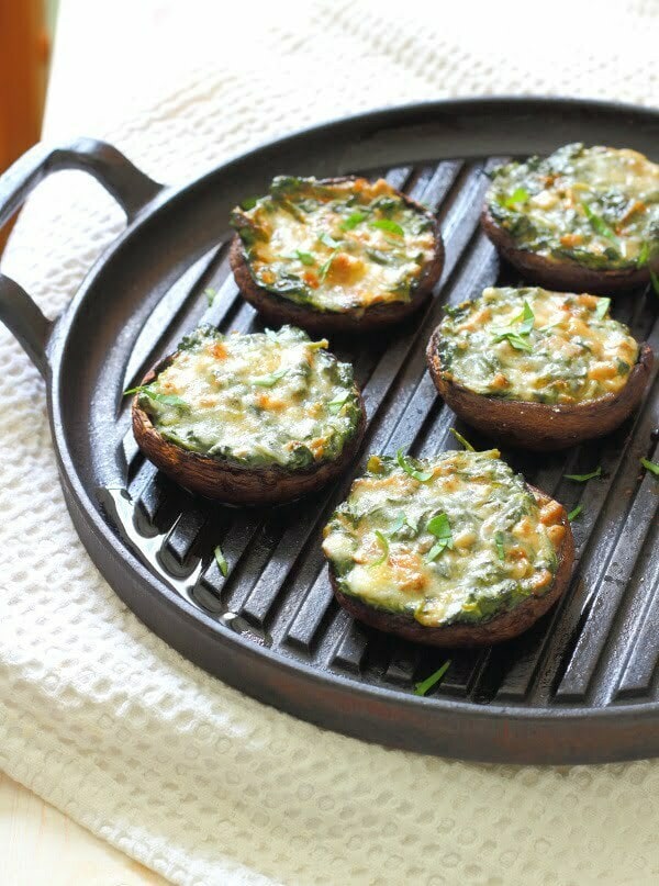 Creamy Spinach Stuffed Mushroom Recipe - Portobello mushrooms stuffed with creamy garlic spinach, then topped with grated parmesan - the perfect summer lunch!