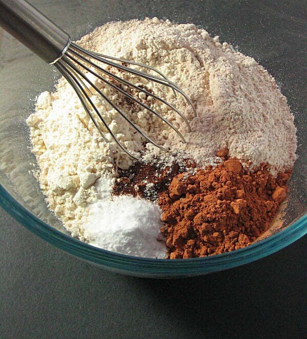 Hazelnut chocolate chip quick bread ingredients - flour, cacao powder, baking soda, salt and espresso powder.