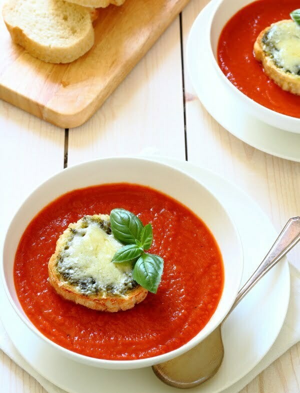 Roasted Red Pepper & Tomato Soup Recipe - Lightly spiced, warming and comforting and served with cheesy pesto toasts for dunking!