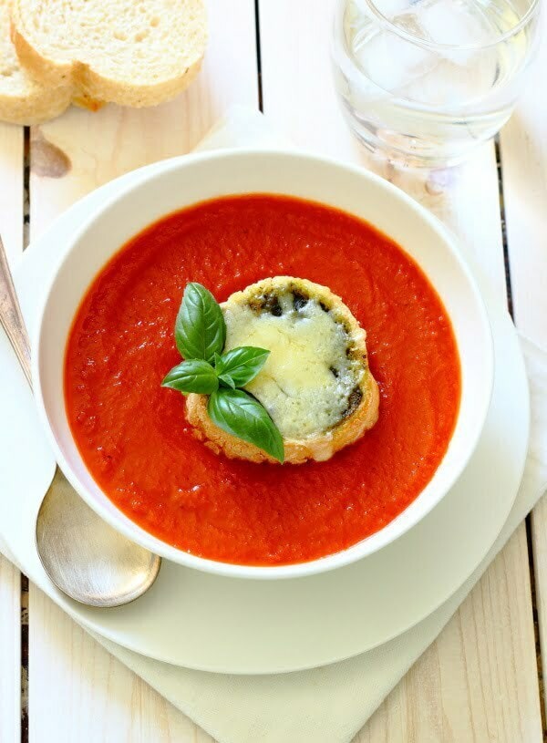 Roasted Red Pepper & Tomato Soup Recipe - Lightly spiced, warming and comforting and served with cheesy pesto toasts for dunking!