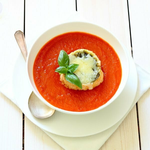 Roasted Red Pepper & Tomato Soup Recipe - Lightly spiced, warming and comforting and served with cheesy pesto toasts for dunking! | sliceofkitchenlife.com