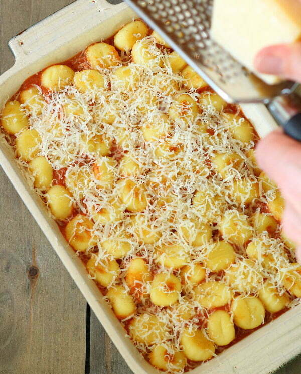 Sausage, Pepper and Gnocchi Casserole (One-Pot) - Sausages and peppers in a rich, creamy tomato and basil sauce, topped with crispy, cheesy gnocchi.