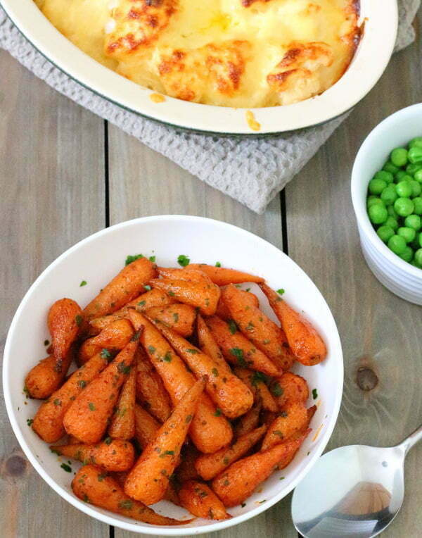 Smoky-Sweet Maple Roasted Carrots Recipe - Transform boring everyday veg into something special - these easy, tasty maple roasted carrots only take a few minutes to prepare!